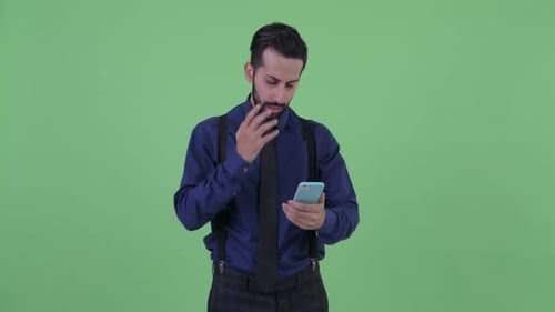 Man Using Phone Receives Bad News