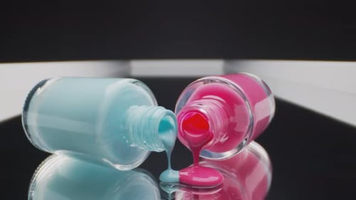 Nail Polish Spilling on Reflective Surface