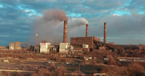 Air Pollution. Clouds of Smoke Coming From the Chimneys of the Plant. Drone Flying Over Smoking
