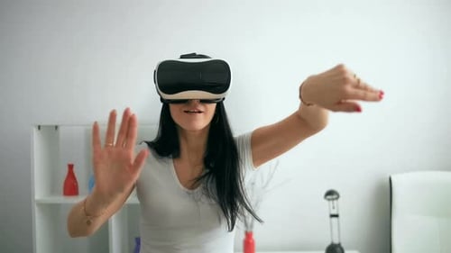 Woman Experiencing Virtual Reality with Headset
