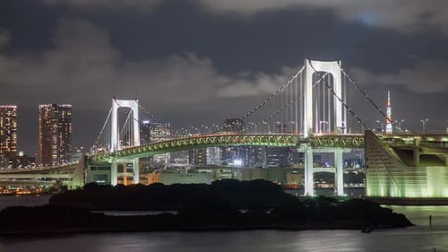 Time Lapse looking across Tokyo Bay at the Rainbow Bridge and Tokyo