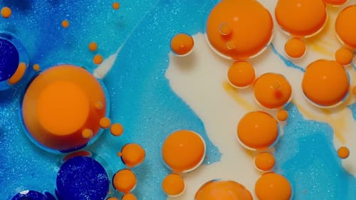 Vibrant Liquid Droplets Forming Abstract Design