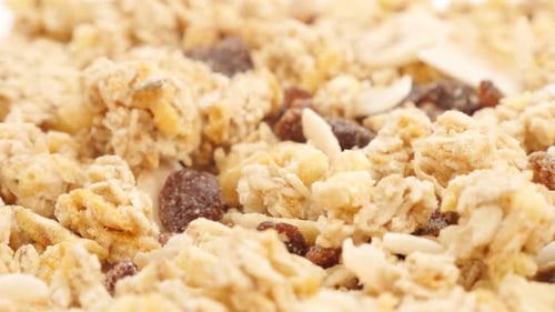 Crunchy and tasty muesli food background close-up slow tilt 4K 3840X2160 UltraHD footage - Cereals