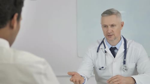 Doctor Consulting with Patient in Bright Office