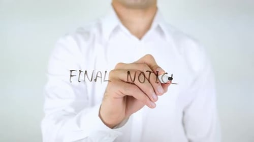 Writing Final Notice on Clear Surface