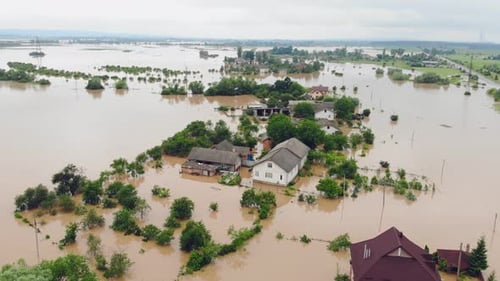 Aerial View Floods and Flooded Houses. Mass Natural Disasters and Destruction. A Big City Is Flooded