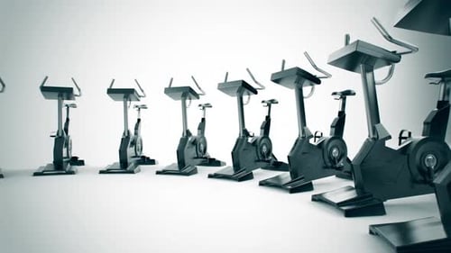 Gym equipment stationary bikes standing in the circular array. Loopable. HD