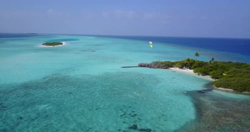 Natural aerial abstract view of a sandy white paradise beach and blue water background
