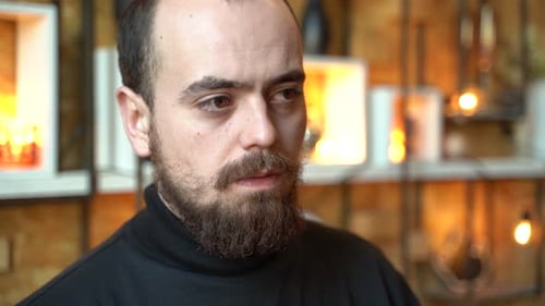 Contemplative Man with Beard Close Up