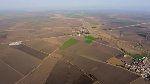 Brown Fields and Villages