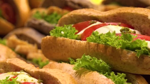 Closeup on Sub Sandwiches on Display on a Counter in a Store