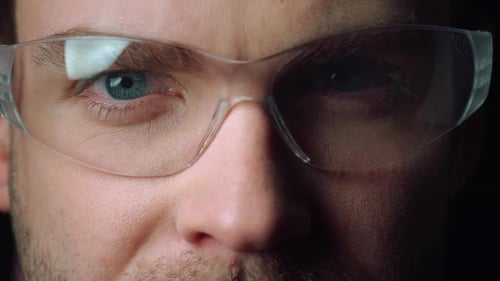 Close Up Portrait of Young Man Wearing Glasses