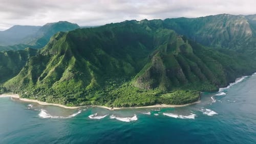 Cinematic Green Mountain Landscape of Wild Island Nature with Blue Ocean Waves