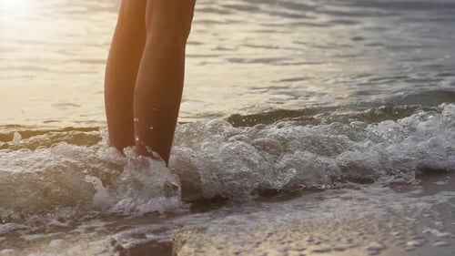 Girl Stand On Beach In Summer