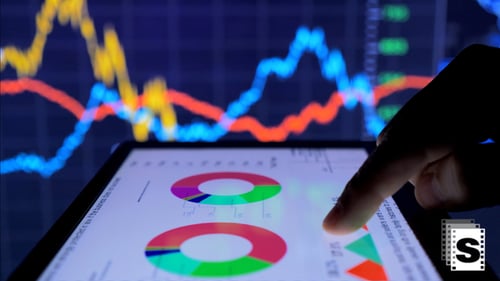 Data Analysis on Tablet with Graph in Background