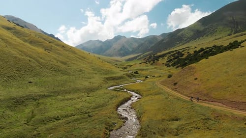 People Ride Bicycle at the Mountain Valley