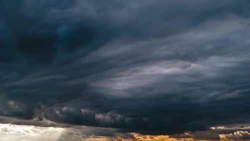 Dramatic Sky with Dark Storm Clouds at Sunset