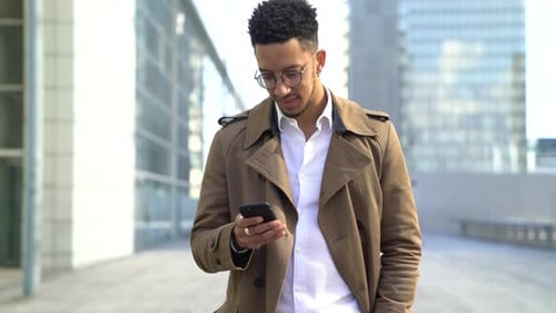 Man Using Smartphone in the City