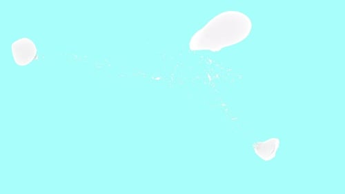 Milk Splash Liquid on Light Blue Organic Nutrition Healthy Food