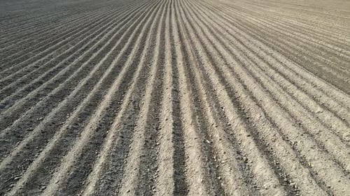 Arial Drone View of a Plowed Field
