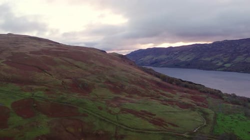 Scenic View of a Rive and Mountain Landscape with a View of the Sunset Sky