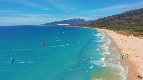 Large Beach Filled with Kite Surfers in Tarifa, Spain