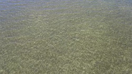 Aerial view of a scenic blue green lake