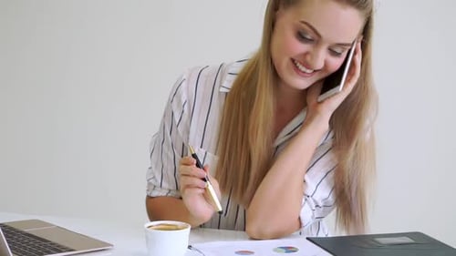 Blonde Business Woman Working at Modern Office