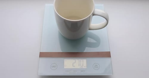 Measuring Water Into Mug on Digital Scale