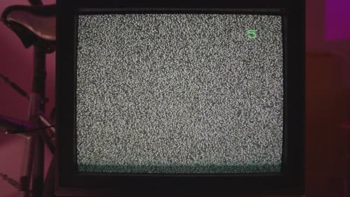 Vintage Television Set Displaying Static Noise