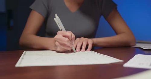 Writing Notes on Paper Indoors