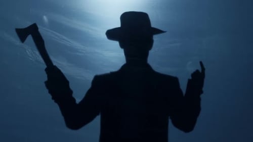 Sinister Silhouette Raises an Axe