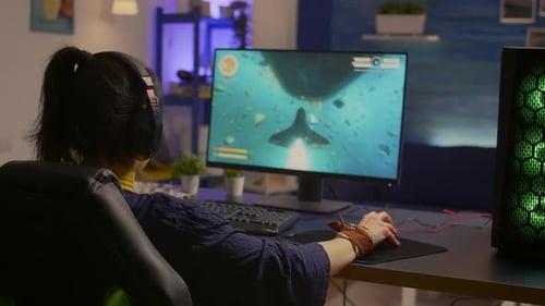 Woman Plays Space Video Game and Wins