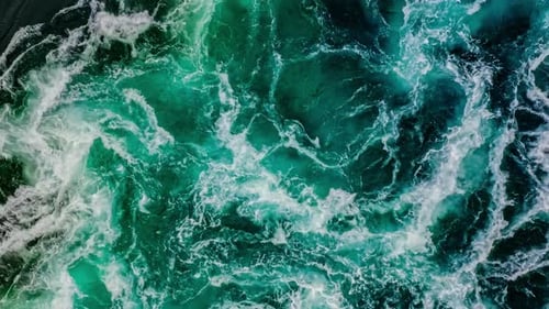 Waves of Water of the River and the Sea Meet Each Other During High Tide and Low Tide