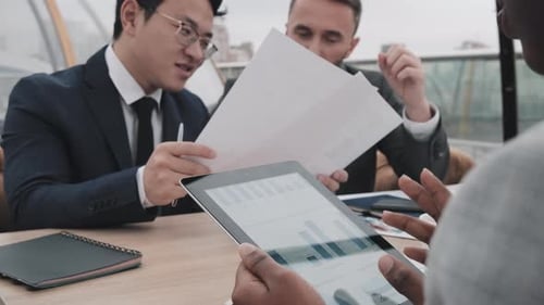Cropped Businesswoman Using Tablet