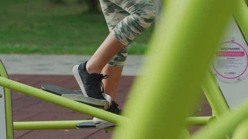 Legs Exercising on Outdoor Elliptical Machine