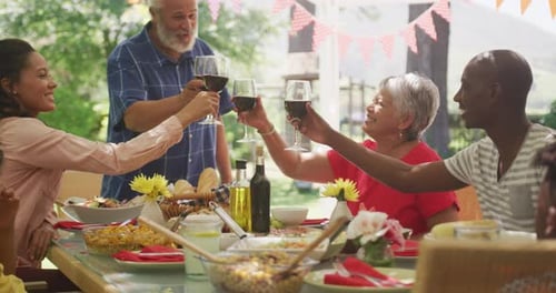 Multi-generation African American family spending time in garden