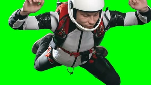 Skydiver in Freefall Against Green Screen