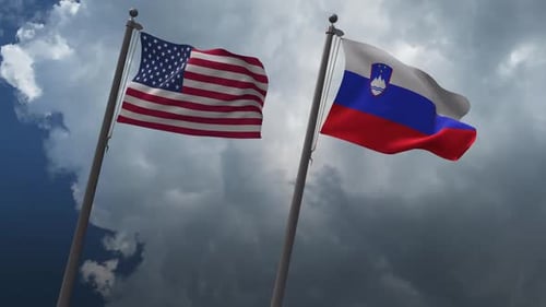 United States and Slovenia Flags Waving Together