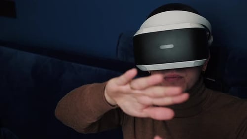 Young Adult Exploring Virtual Reality with VR Headset