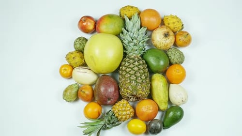 Variety of Fresh Fruits on a White Surface