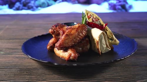 Roasted Chicken Wings and Wrap on Plate