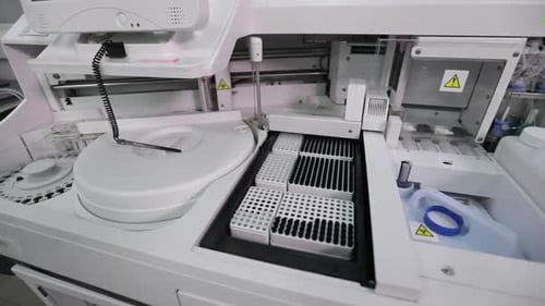 Automated Clinical Analyzer Testing Blood Samples
