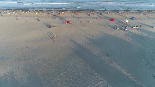 Flying Towards The Sea Over The Beach