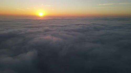 Majestic Sunrise over a Sea of Clouds