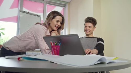 Young College Couple Enjoying Studying Together