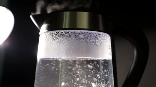 Clear Electric Kettle Boiling Water Close Up