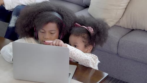 Children Watching Laptop at Home