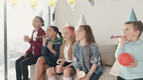 Children Celebrate a Birthday with Party Favors