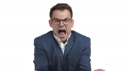 Man Yelling in Blue Suit and Glasses